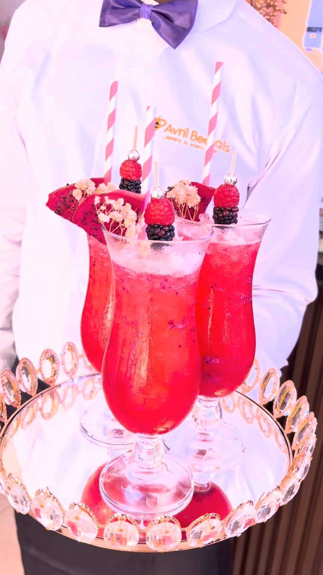 Red carpet ready! ❤️✨ At AvrilBeetails Cocktail Company, presentation is everything. Our professional servers ensure your guests receive the royal treatment with every drink. These stunning red frozen cocktails, served on a mirrored tray and garnished with fresh dragon fruit and berries, are guaranteed to turn heads at your next luxury event.